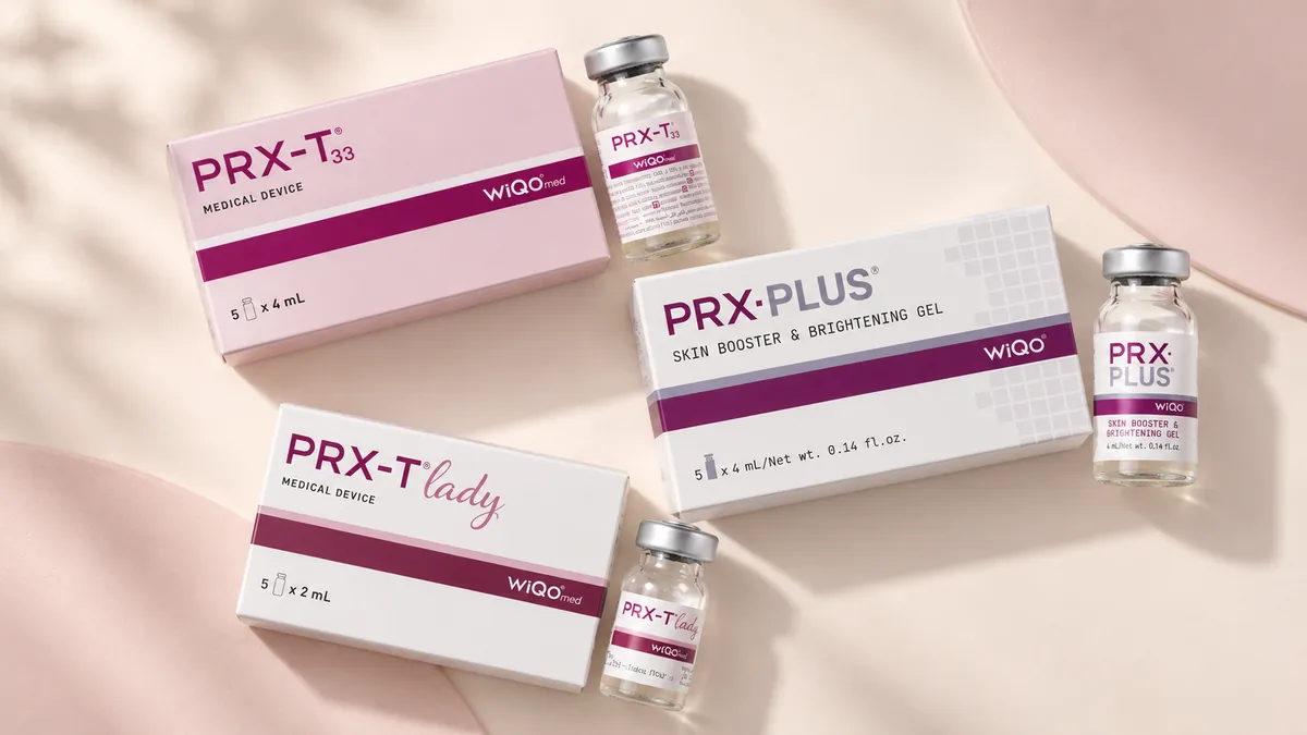 Vista de cima de PRX-T33, PRX-PLUS e PRX-T Lady da WiQo, cada um com caixa e frasco, sobre um fundo creme rosado.